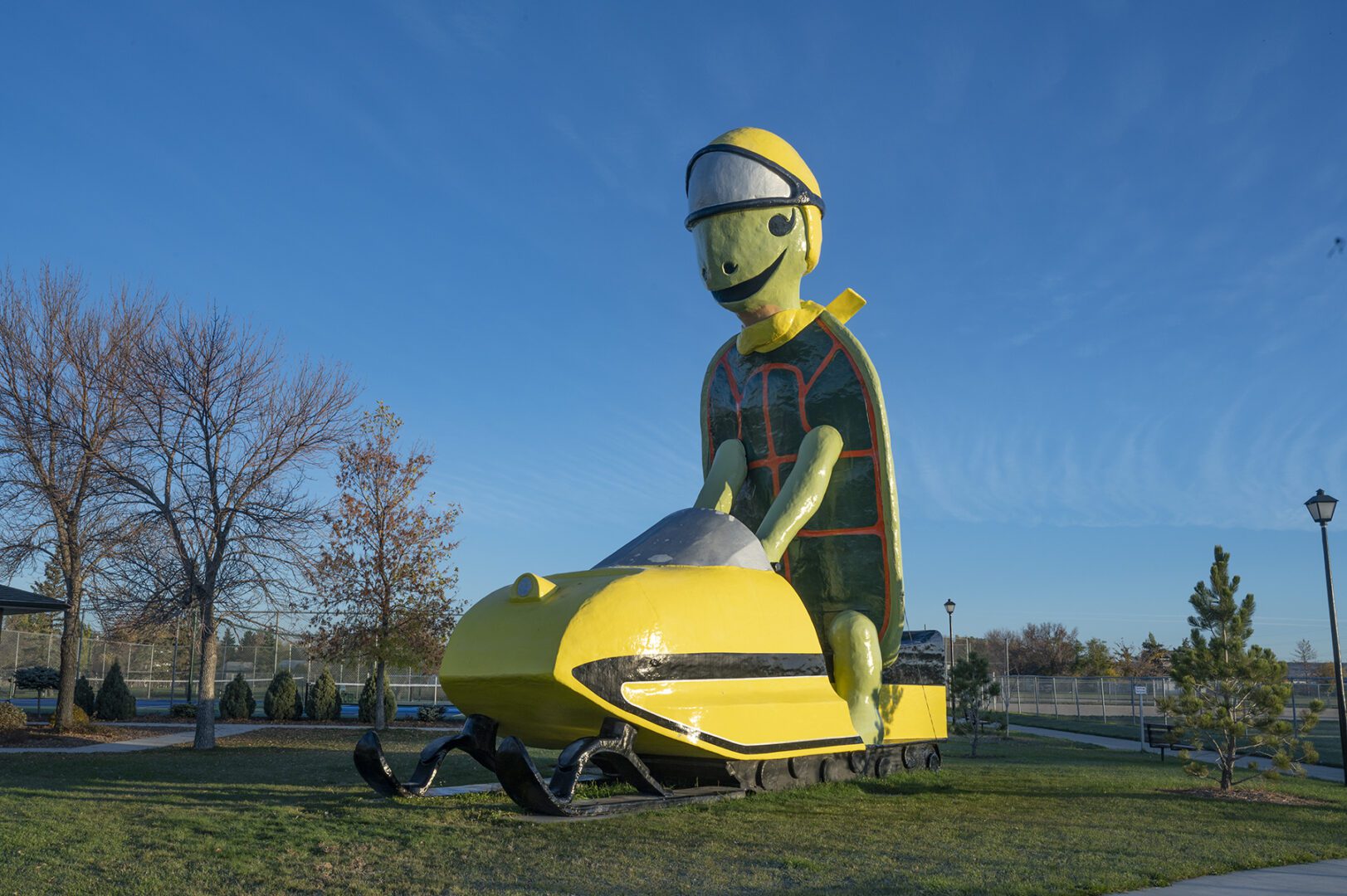 A large statue of a turtle on a snowmobile, called Tommy the Turtle is an icon at Bottineau, North Dakota, Oct. 16, 2023.
